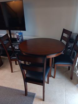 Kitchen dining room table with four chairs