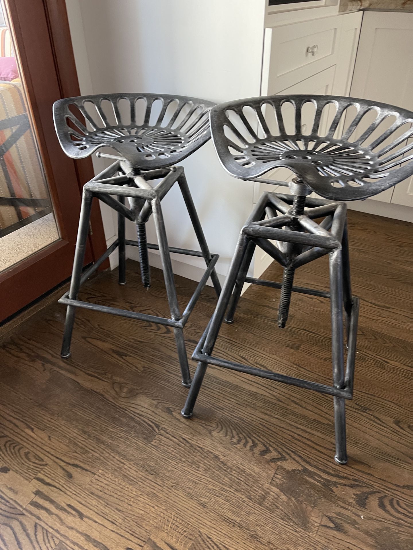 Two Tractor Seat Stools