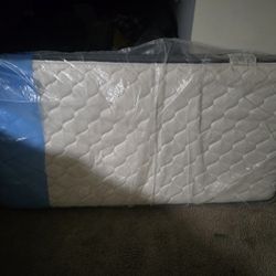 Twin Mattress Still In Platic With Metal Twin Bed