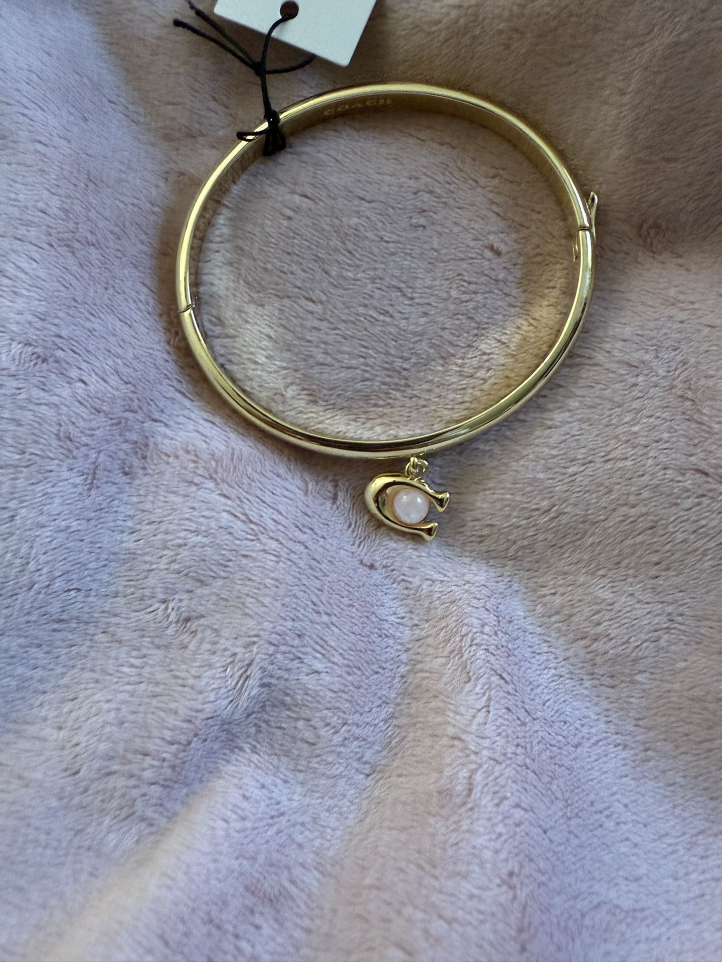 NWT Coach Bangle C With A Pink Pearl Bracelet It’s Gold Tone It’s Beautiful
