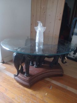 3 elephant tables set glass top