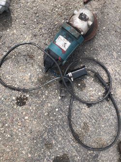 Makita heavy duty 9 inch disc grinder handle broke works fine