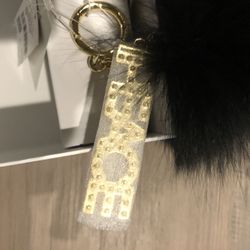 Michael Kors keychain w/peace charm