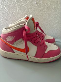 Orange and pink Jordan’s