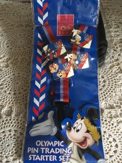 NEW- 4 Disney Collector’s Pins on a Lanyard