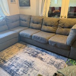 L Shape Gray Couch With Bed 
