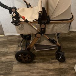Gold And Black Baby Stroller