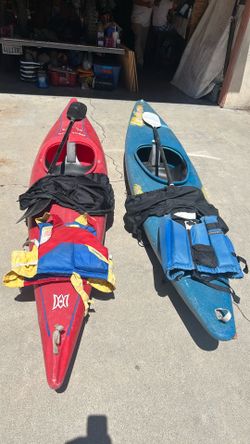 2 11’ Whitewater Kayaks w/ paddles, skirts and life vests