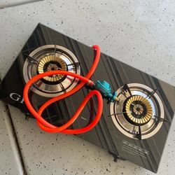 Two burner gas stove with stand.