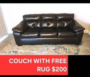 COUCH WITH FREE RUG $125  PICK UP ONLY Flamingo & Jones