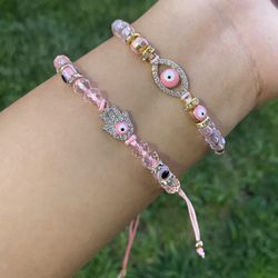 evil eye bracelets - pink / white