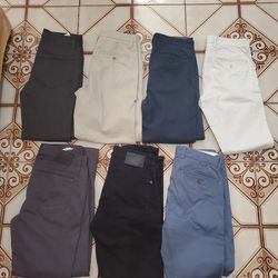 7 Mens Brand Name Pants. Size 28 And 29