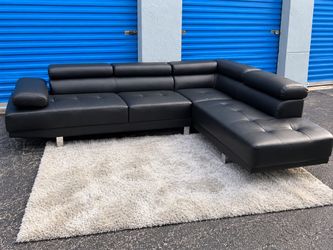 Black leather sectional sofa(free delivery)