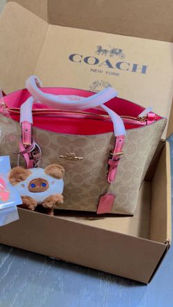 Coach nueva en su caja