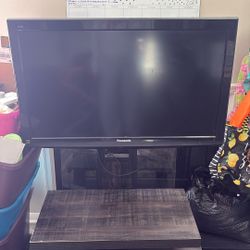 49 Inch Panasonic Tv including Tv Stand 