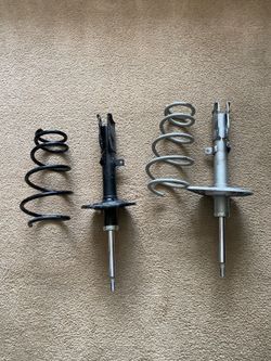 Absorber set, shock and spring