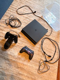PlayStation 4 with 2 controllers