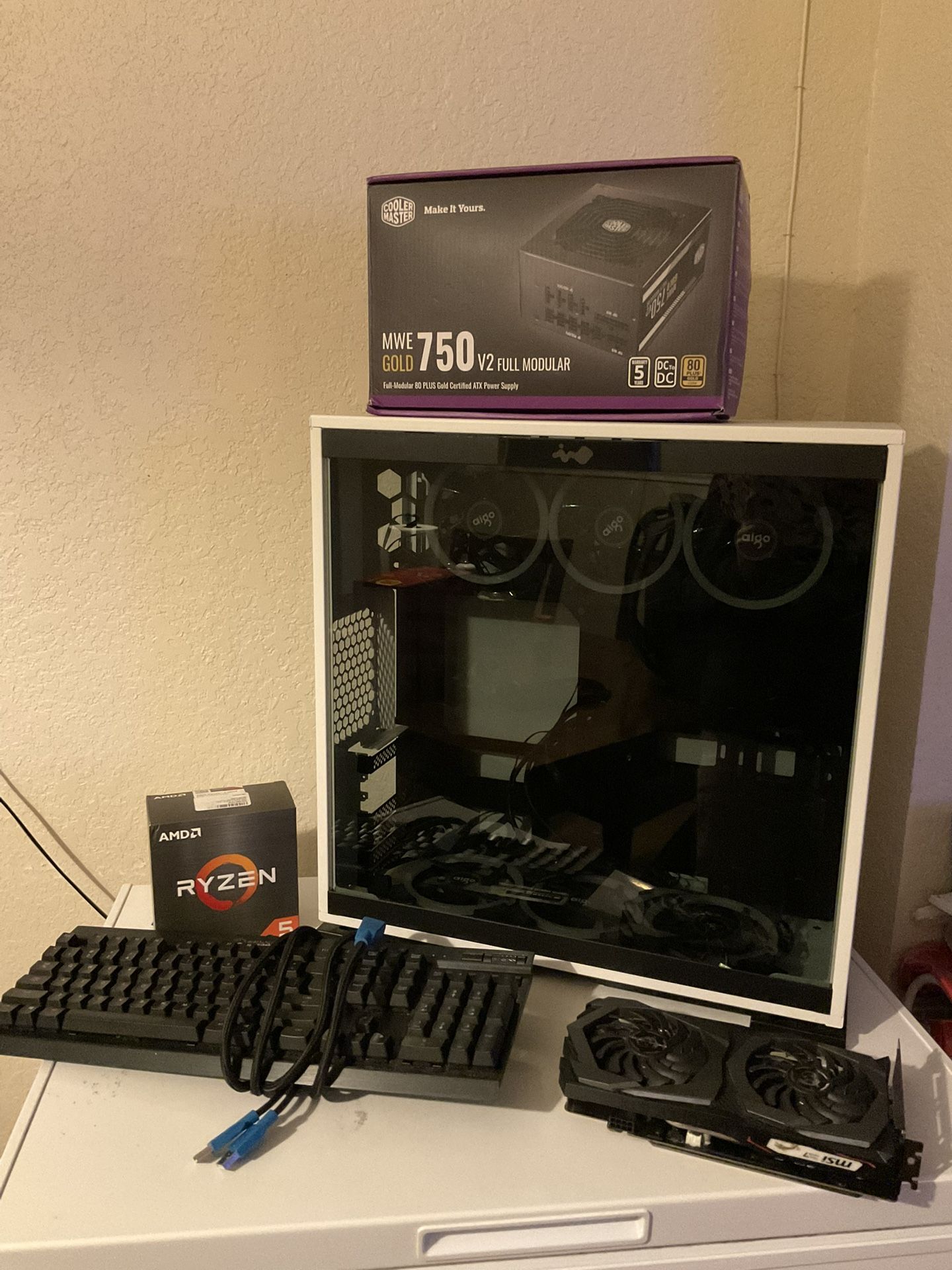 Geforce GTX 1660ti, ryzen 3 3300x, pc case with fans, 650 watt psu, corsair keyboard