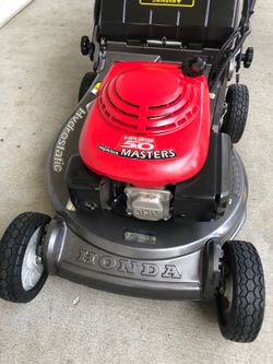 Genuine Honda hydrostatic, electric start self-propelled, lawnmower, beautiful condition