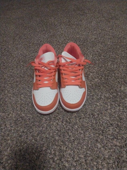 Orange and White nike lows