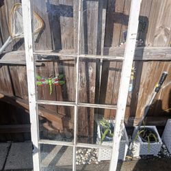 Farmhouse Widow Decor Has Wall Hangers