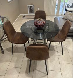 Round glass table + 4 suede brown chairs $80 OBO