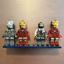 War Machine, 2 Iron Man, and Battle Damaged Ultron. 