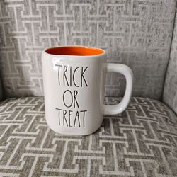 Rae Dunn TRICK OR TREAT Halloween Mug White Orange Interior NWOT