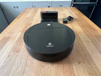 Lefant Model M213 Robot Vacuum    Works well  Comes with the charging dock