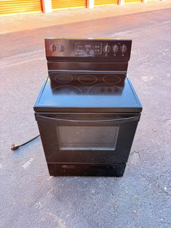 Frigidaire 30-in Glass Top 5 burners 5.3-cu ft Freestanding (Black)