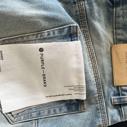purple jeans size 33 a little bit of dirt stains a little above the hem and little rips aswell and 1 stain on the purple tag in the front i’m pretty s