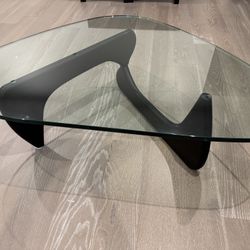 Modern Glass Coffee Table with Black Sculptural Base