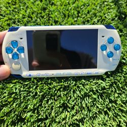 (Read) White & Blue PSP 3000 - 6,000 Games installed w/Battery & Charger