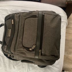 Tumi brief backpack 