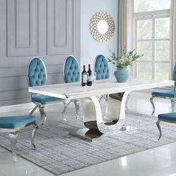 Our Best Seller Is Back! 7 PCS Paris Collection Marble top dining table set- Stainless still chairs -available in 4 colors Now 3489.00 Free Delivery