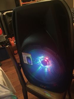QFX portable speaker with Bluetooth and rechargeable and lights up