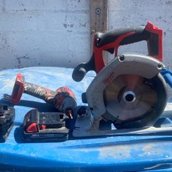 Milwaukee Impact And Skilsaw With 6.0 And 2.0 Battery