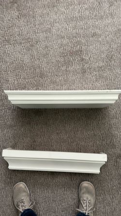 2 cream colored shelves