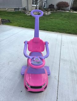 Pink and Purple Toddler Ride-On Toy