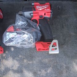 Milwaukee  1/2 Inch Impact Battery And Charger 