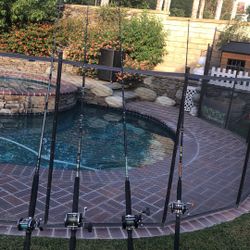 Four (4) Saltwater Fishing Rods From 6’-7’(Shimano,Penn,ect) With Penn & Daiwa Reels 