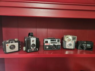 Five antique cameras
