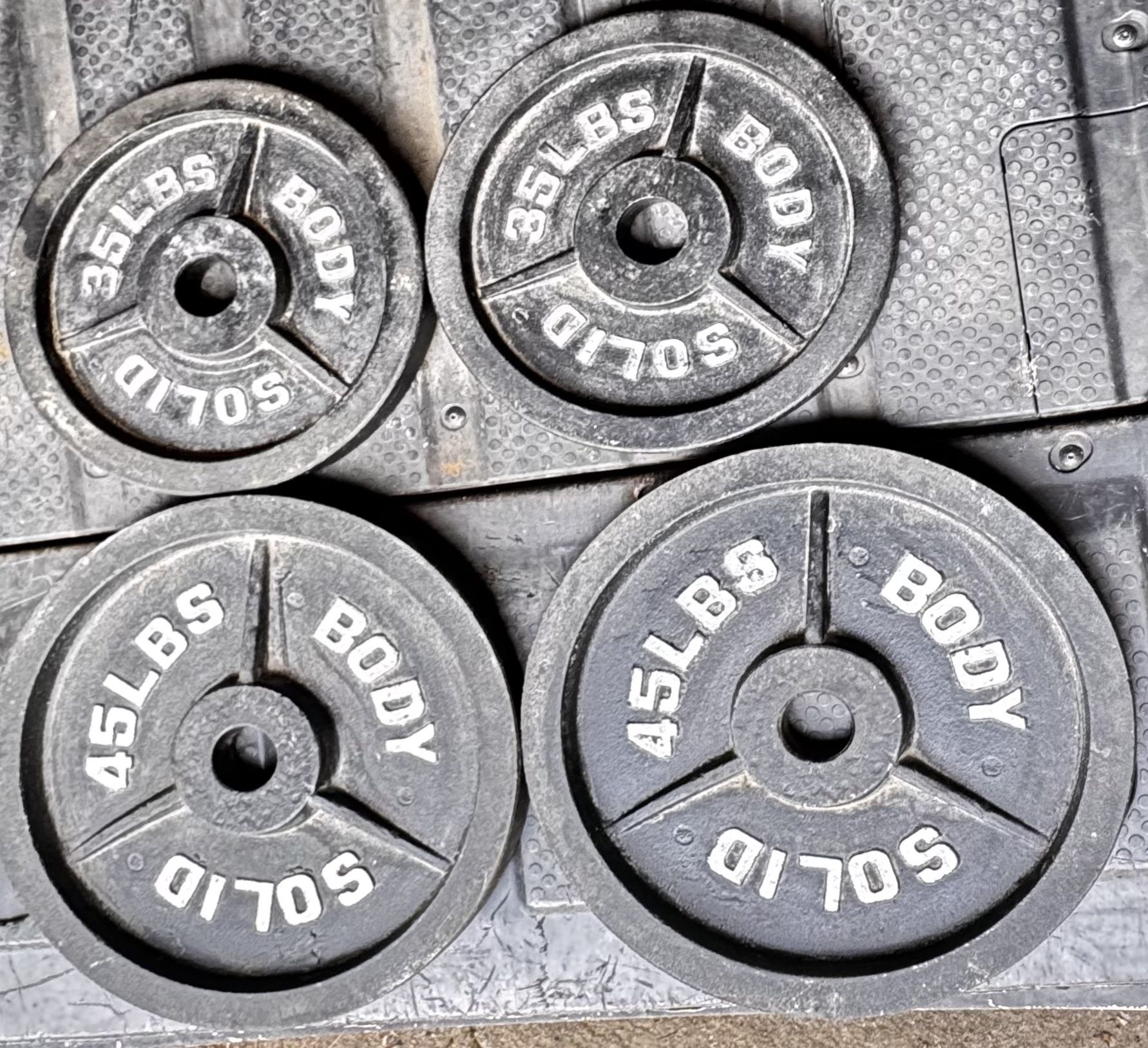 Iron Body Solid Plates 20lbs Axle Barbell