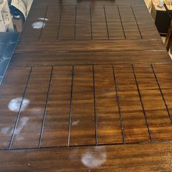 Dining room table with bench and four chairs