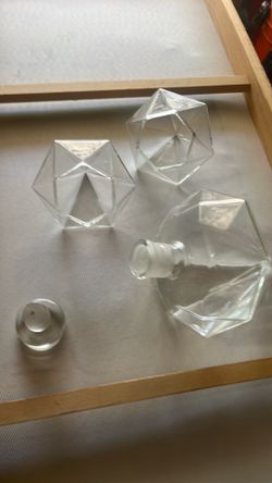 Diamond shaped glass decanter and two cups