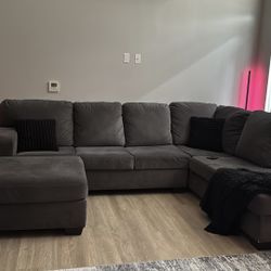 Ashley Altari 2‑Piece Sectional with Ottoman