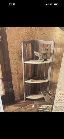 Furio folding corner bookcase. brand new