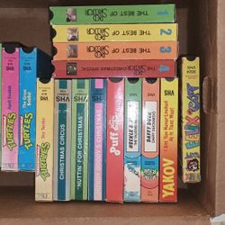 Assorted DVDs And VHS Tapes 