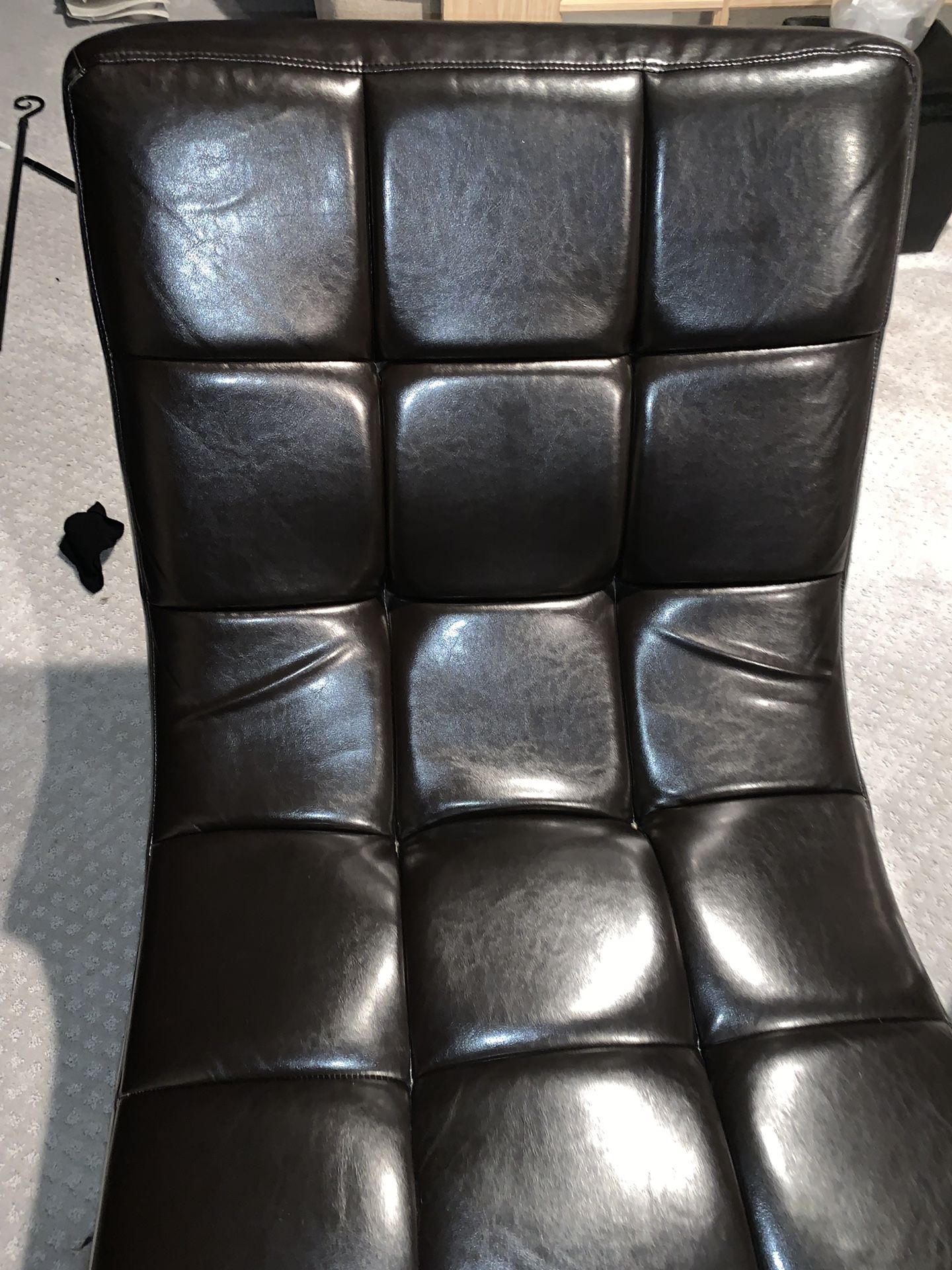 Beautiful chocolate brown leather lounge chair. Mint condition!