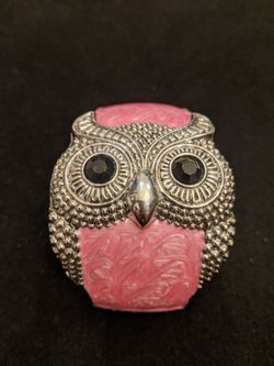 $10. Owl pink enamel bracelet with black rhinestone eyes. Fits up to 7 inch wrist.